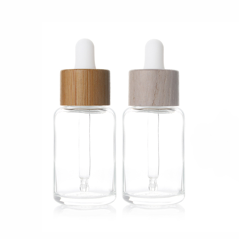 Custom 30ml 1oz wood bamboo lid glass dropper bottle serum tinctures CBD essential oil testing vial clear droplet bottle