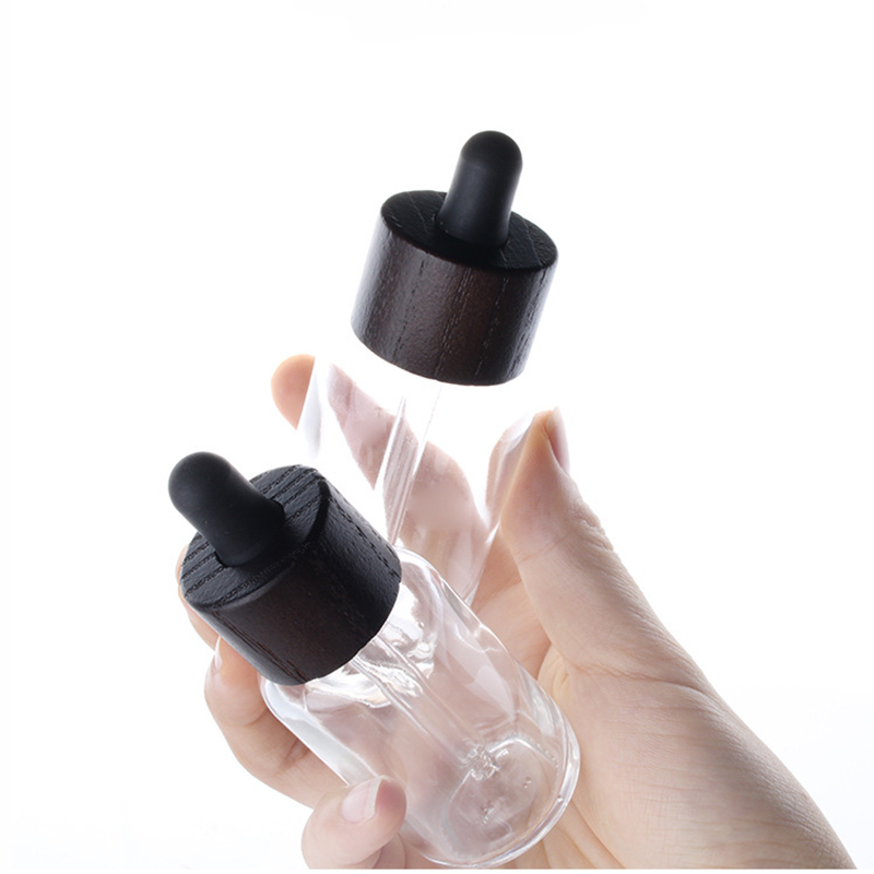 Custom 30ml 1oz wood bamboo lid glass dropper bottle serum tinctures CBD essential oil testing vial clear droplet bottle