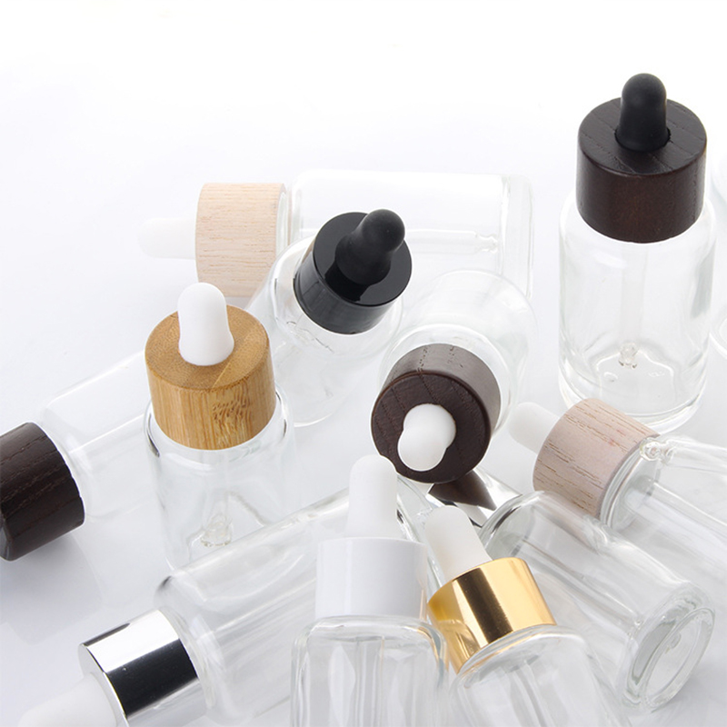 Custom 30ml 1oz wood bamboo lid glass dropper bottle serum tinctures CBD essential oil testing vial clear droplet bottle