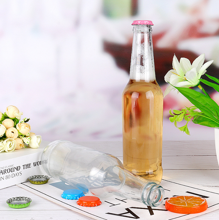 Custom 330ml Empty Transparent Glass Beer soda Juice Bottle with Crown Cap Factory Supplier
