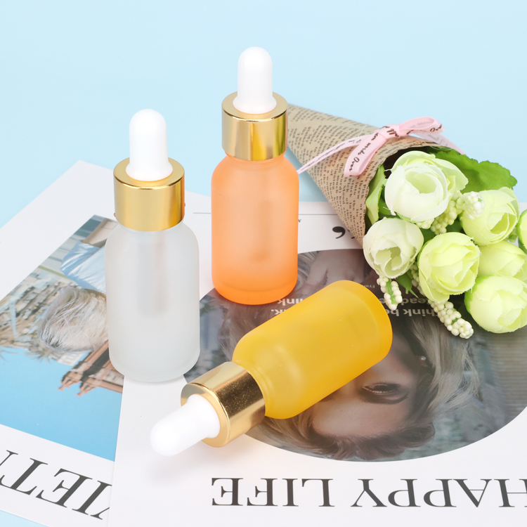 Custom 5 10 15 20 30 50 100 ml round serum oil black frosted glass bottles with gold dropper and pipette for cosmetics