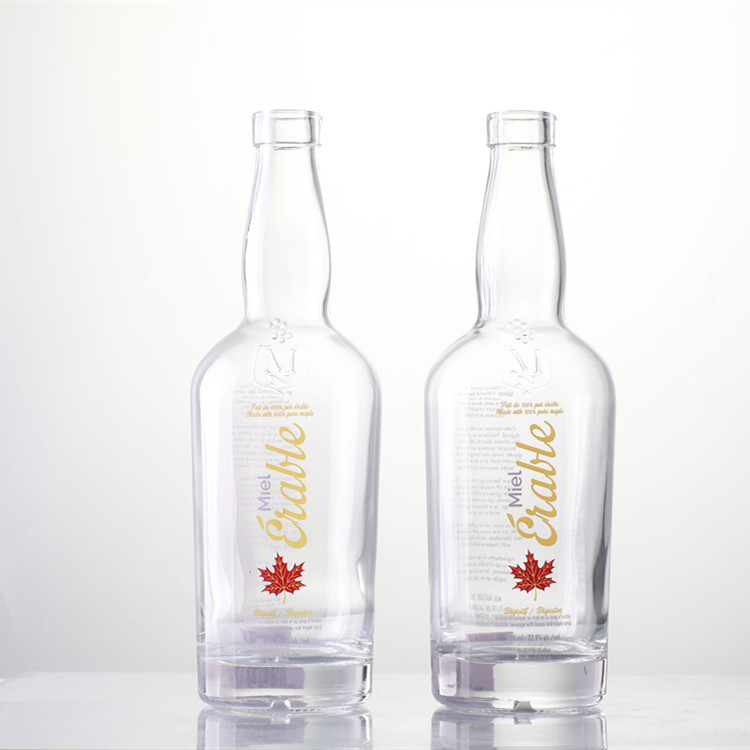 Custom 500 ml 750 ml 1000 ml premium white glass bottle for liquor beer beverage decoration