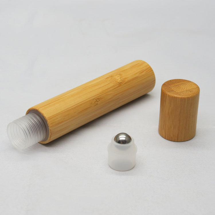 Custom 5ml 10ml 15ml essential oil glass roller bottle with bamboo cap roll on gemstone roller bottle