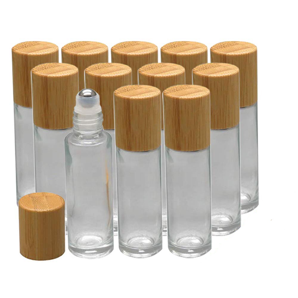 Custom Arabic Wholesale Bamboo Amber Essential oil empty bottle 10ml creative glass metal essential oil roller bottles