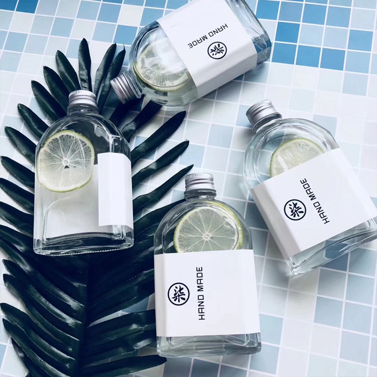 Custom Design 250Ml 500Ml Clear Boston Round Glass Bottle 350Ml Empty Round Cold Pressed 200Ml Juice Bottle With Aluminum Screw