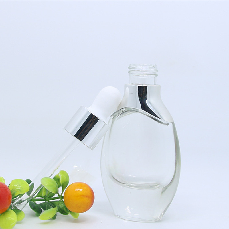 Custom Flat Shape Essential Oil Bottle With Cristal Decorative Glass Essential Oil Bottles Luxury Essential Oil Bottle Pump