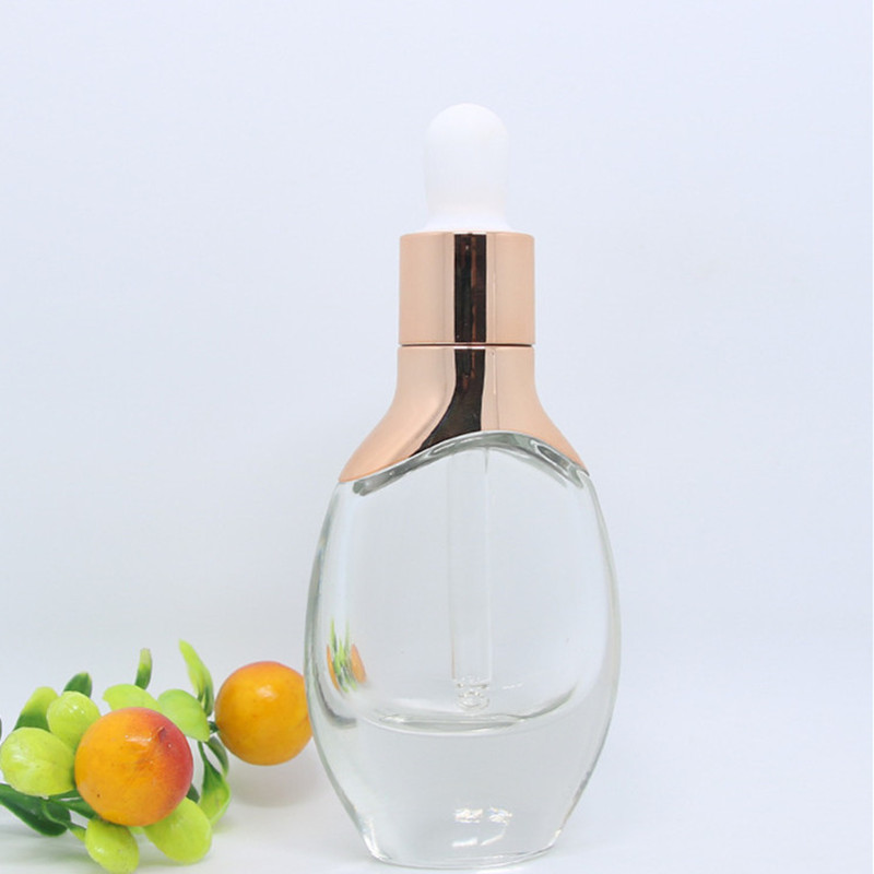 Custom Flat Shape Essential Oil Bottle With Cristal Decorative Glass Essential Oil Bottles Luxury Essential Oil Bottle Pump