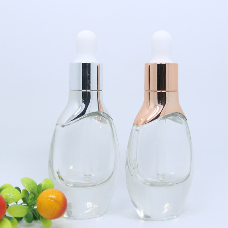 Custom Flat Shape Essential Oil Bottle With Cristal Decorative Glass Essential Oil Bottles Luxury Essential Oil Bottle Pump