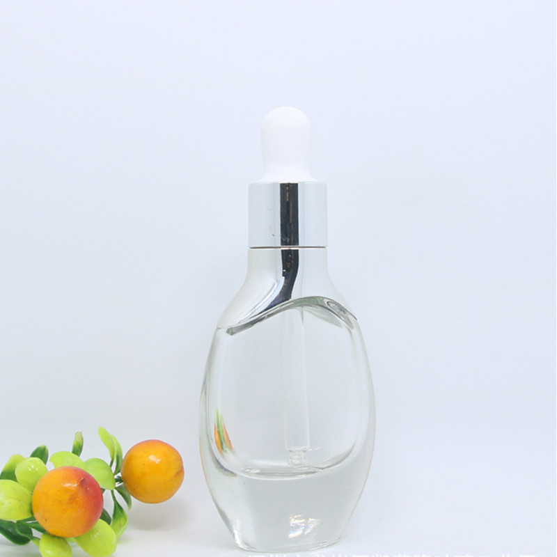 Custom Flat Shape Essential Oil Bottle With Cristal Decorative Glass Essential Oil Bottles Luxury Essential Oil Bottle Pump