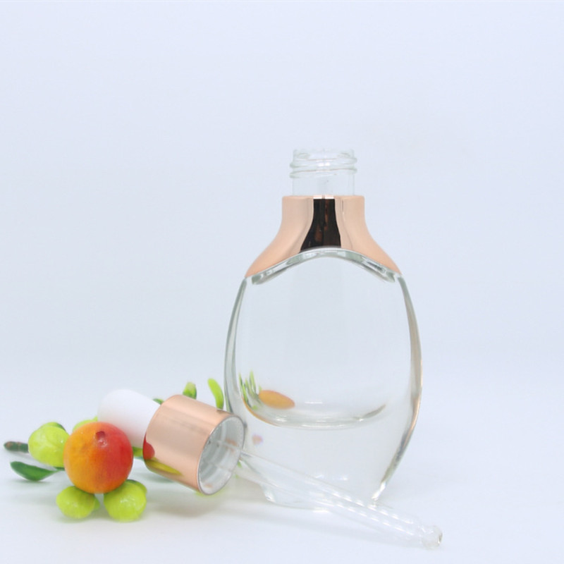 Custom Flat Shape Essential Oil Bottle With Cristal Decorative Glass Essential Oil Bottles Luxury Essential Oil Bottle Pump