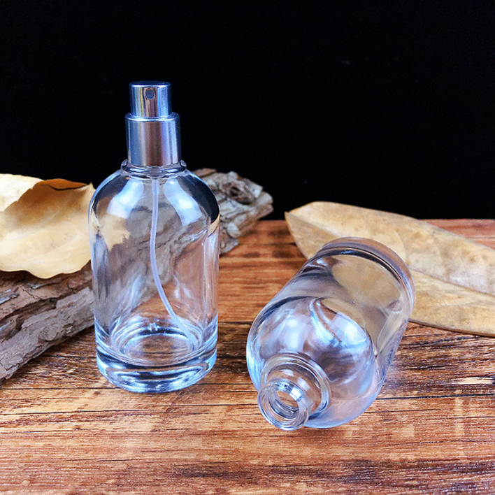 Custom Logo Luxury Mist Spray Transparent 50ml Round Glass Bottle Wholesale Empty Glass Perfume Bottle