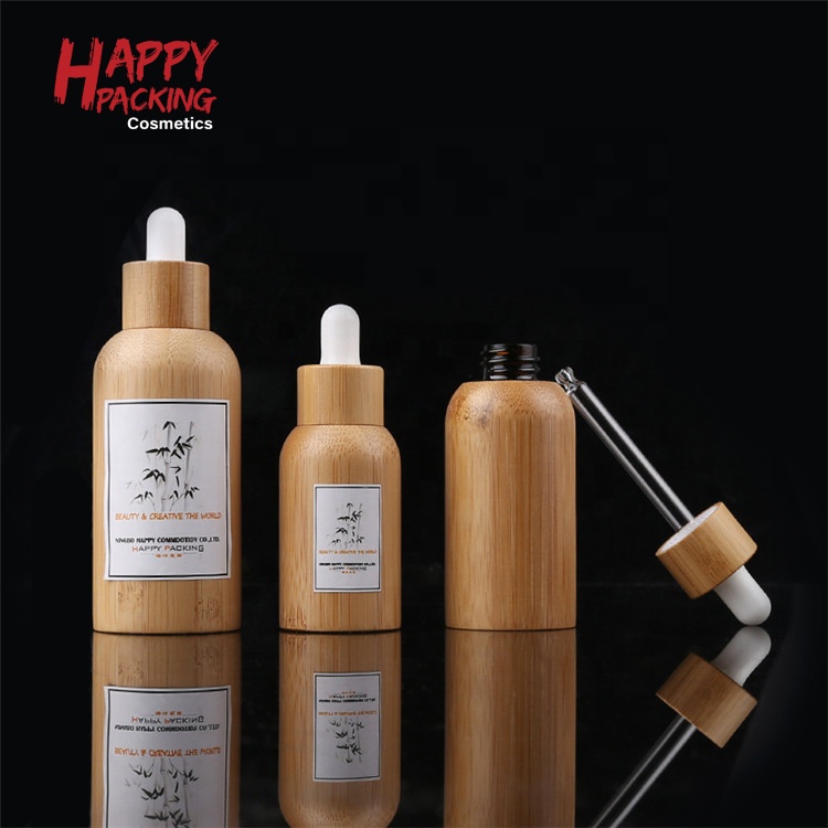 Custom Logo Natural Bamboo Housing Glass Essential Oil Bottles 30ml 50ml Dropper Bottle