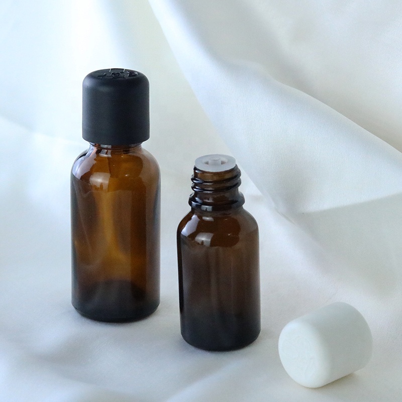 Custom child proof glass bottle 15ml 20ml 30ml 50ml 100ml Amber essential oil bottle with child-proof cap (GRA17)