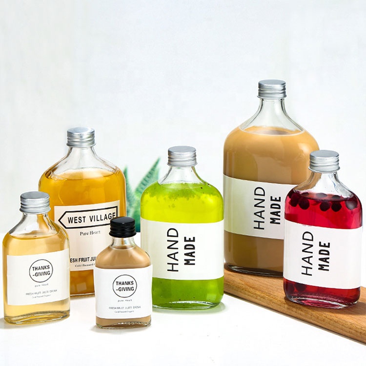 Custom clear 50ml 100ml 200ml 250ml 350ml 500ml liquor wine juice Cold Brew Coffee flat glass bottle with aluminum screw cap
