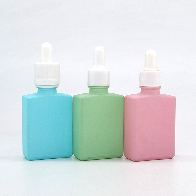 Custom color cylinder shaped 30ml oil dropper bottles serum bottle for skincare cosmetic packaging