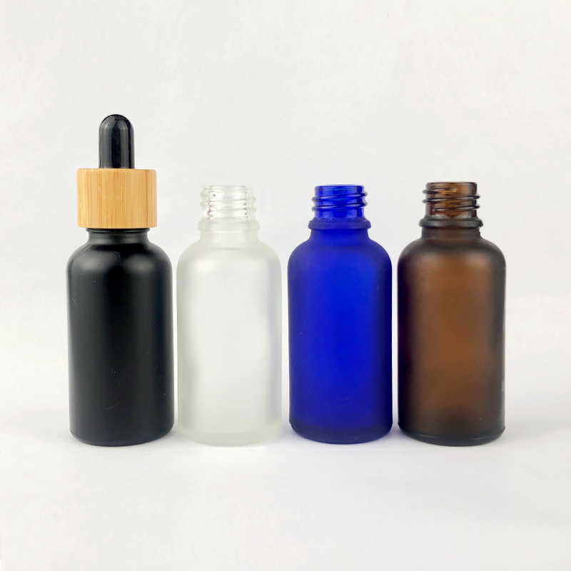 Custom color matt frosted dropper bottle with bamboo cap 30ml glass dropper bottle