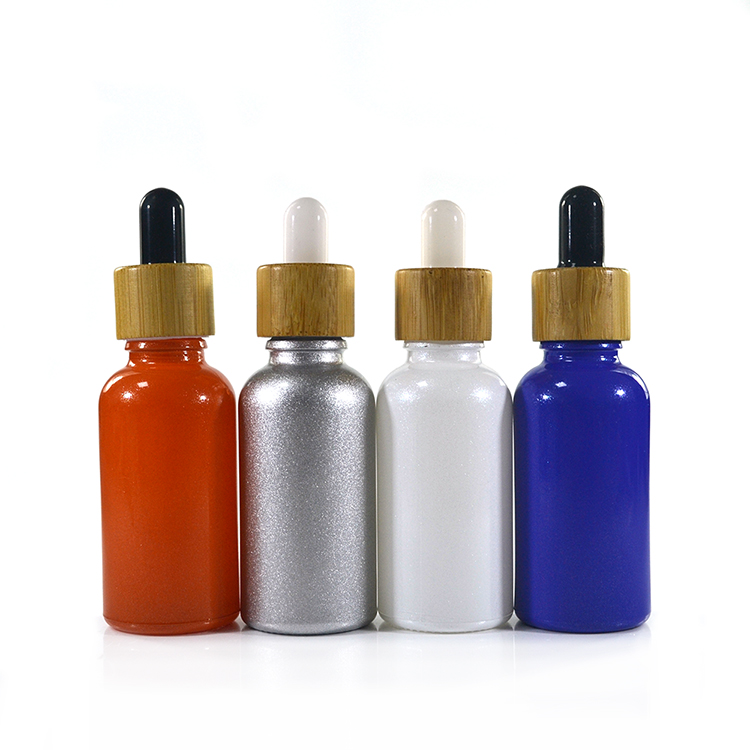 Custom cosmetic skincare glass dropper bottle 5ml 10ml 15ml 20ml 30 ml 50ml 60ml 100ml with bamboo lid for essential oil