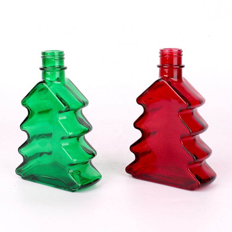 Custom design 220ml Christmas tree glass beverage bottle with screw top lid