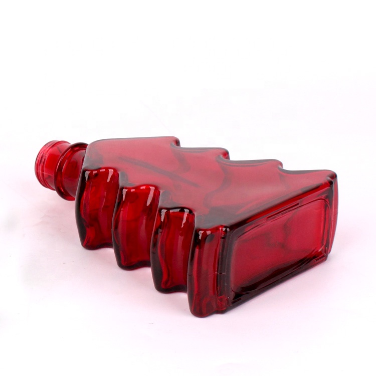 Custom design 220ml Christmas tree glass beverage bottle with screw top lid