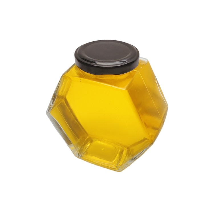 Custom design 380ml hexagonal shape empty honey glass bottle jar with black metal cap