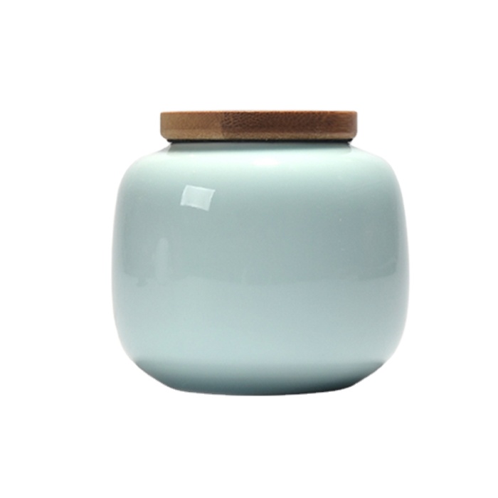 Custom design ceramic small tea canister with bamboo lid