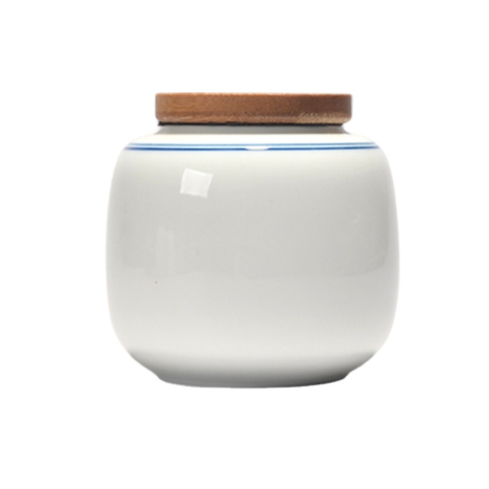 Custom design ceramic small tea canister with bamboo lid