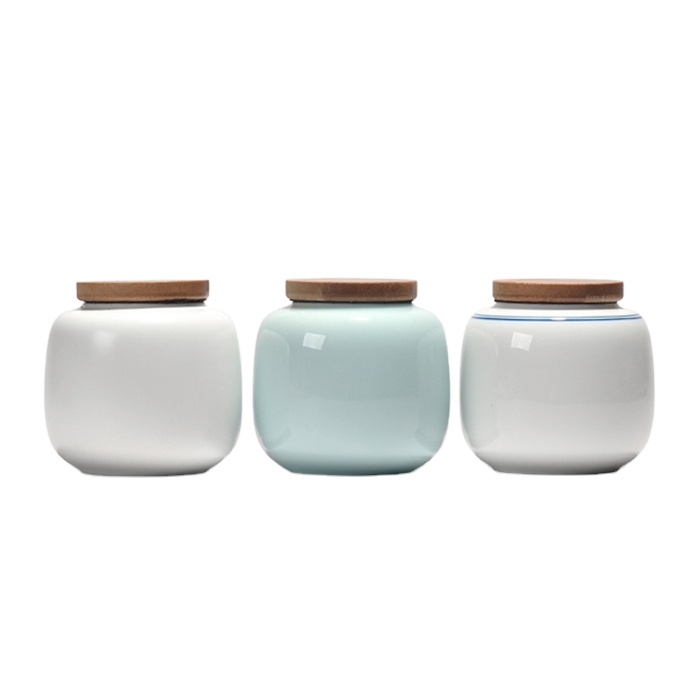 Custom design ceramic small tea canister with bamboo lid
