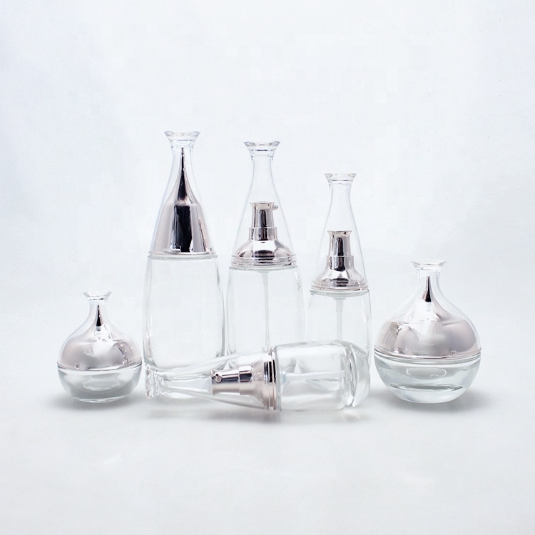 Custom design skin-care clear glass bottle fancy empty cosmetic container  packaging sets