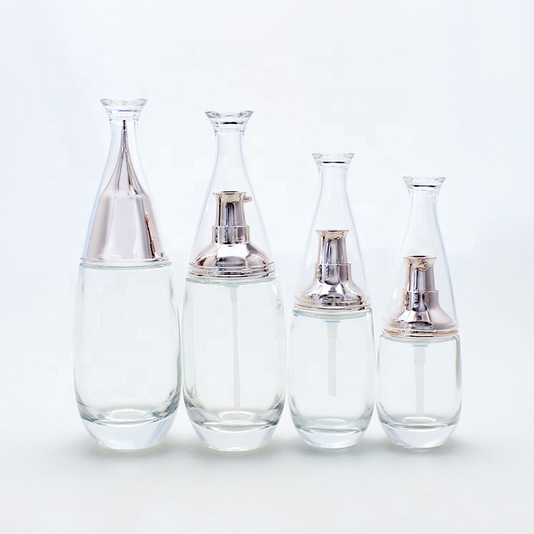Custom design skin-care clear glass bottle fancy empty cosmetic container packaging sets