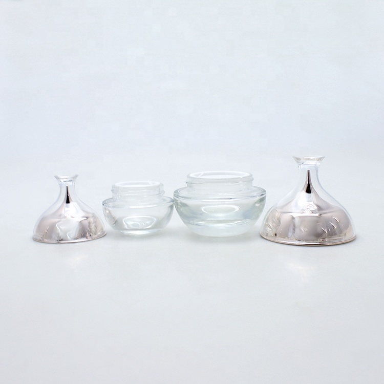 Custom design skin-care clear glass bottle fancy empty cosmetic container packaging sets