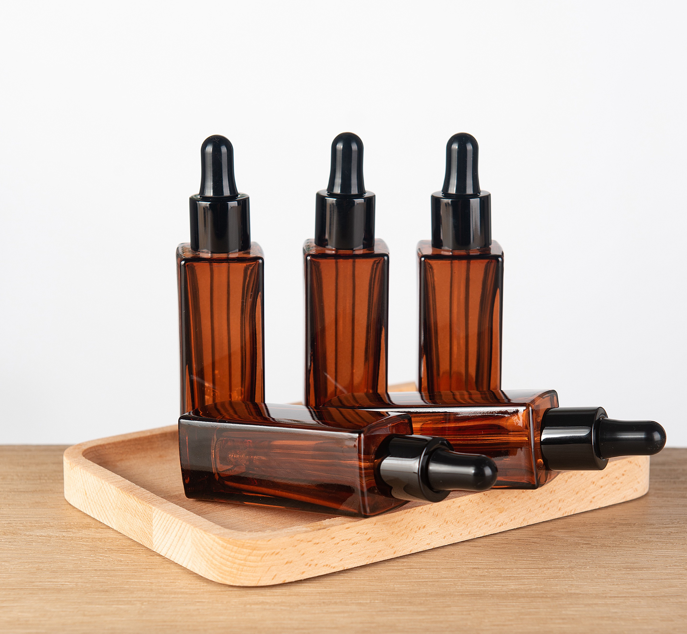 Custom eco friendly cosmetic skincare packaging container oil glass dropper bottle 30ml with aluminum dropper