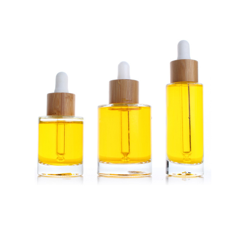 Custom eco friendly cosmetic skincare packaging container round clear matte glass essential oil dropper bottles