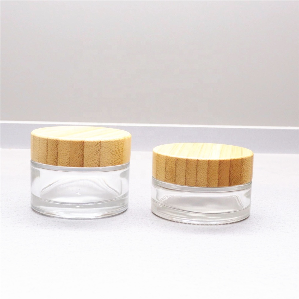 Custom empty 15g 20g 25g 30g 50g 100g 150g 200g 250g cosmetic glass cream jar with round packaging with engrave bamboo lid