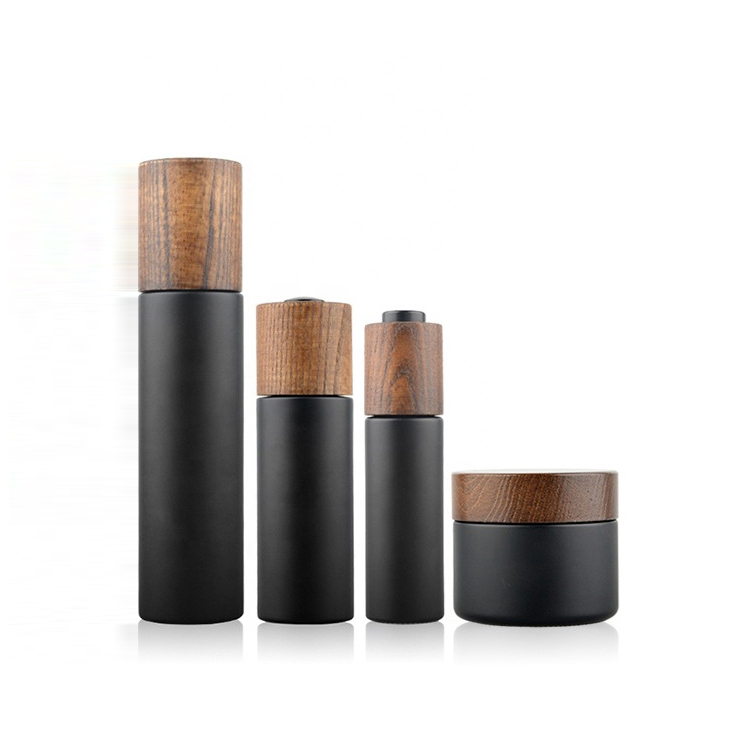 Custom empty 30ml 50ml 100ml matte black wooden lids cosmetic cream glass jar