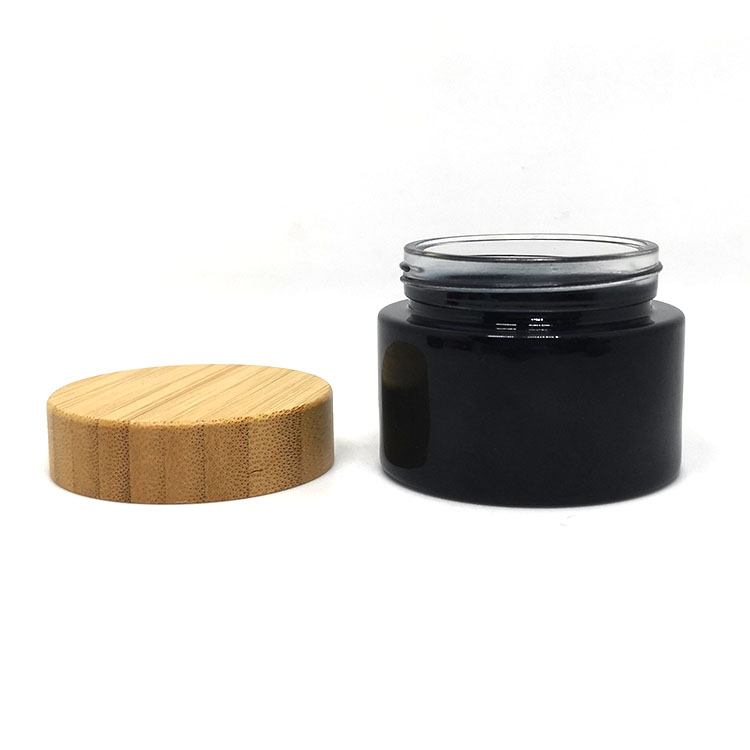 Custom empty 30ml 50ml 100ml matte black wooden lids cosmetic cream glass jar