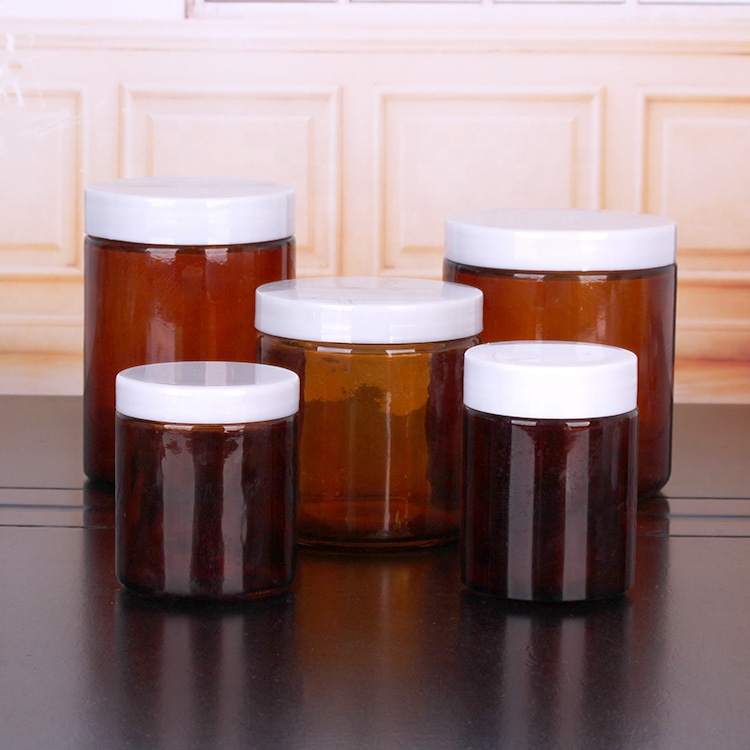 Custom empty16oz 500ml round amber glass jar for food storage spice cookie with plastic screw lids