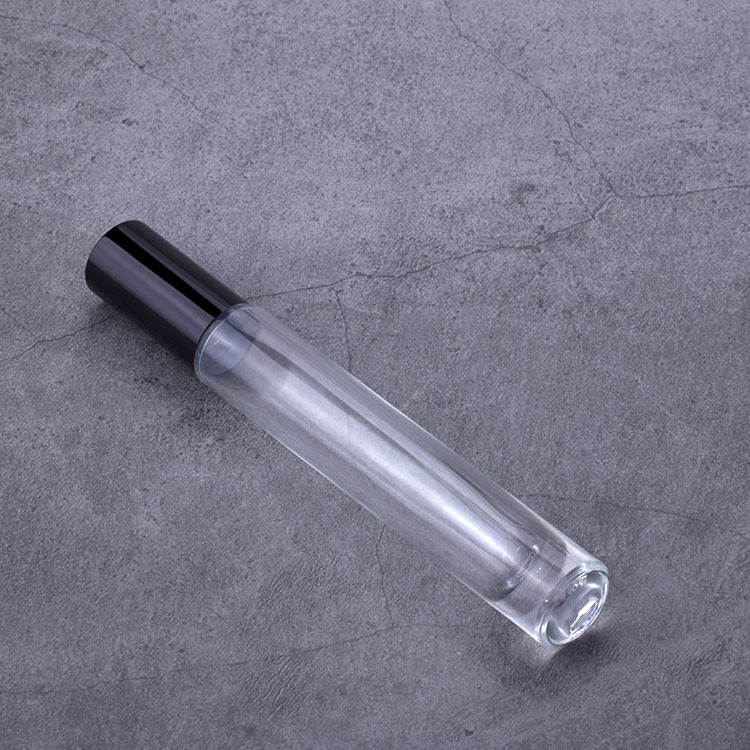 Custom fancy 10ml clear cylinder thick wall heavy bottom roll on essential oil glass bottles with metal roller balls for perfume