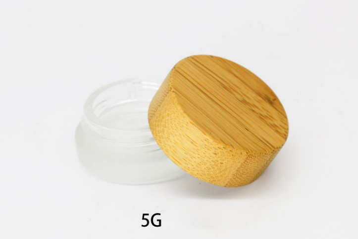 Custom frosted clear Cosmetic Cream Glass skin care jar container and packaging With screw engraved logo bamboo lid