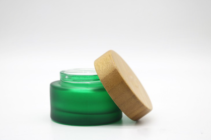 Custom frosted clear Cosmetic Cream Glass skin care jar container and packaging With screw engraved logo bamboo lid