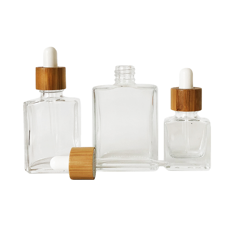 Custom glass bottle 15ml 30ml 50ml clear rectangle essential oil bottle glass dropper bottle with bamboo cap