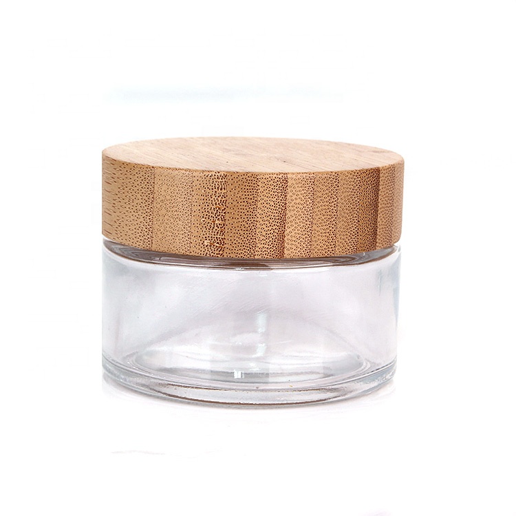 Custom high quality 100ml clear round glass cosmetic cream jar container with bamboo lid