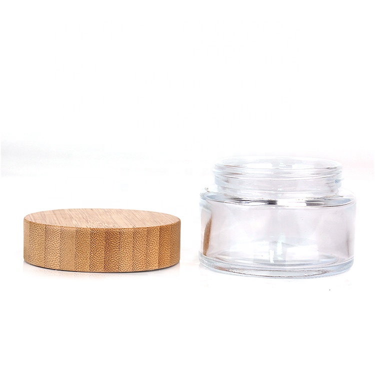 Custom high quality 100ml clear round glass cosmetic cream jar container with bamboo lid