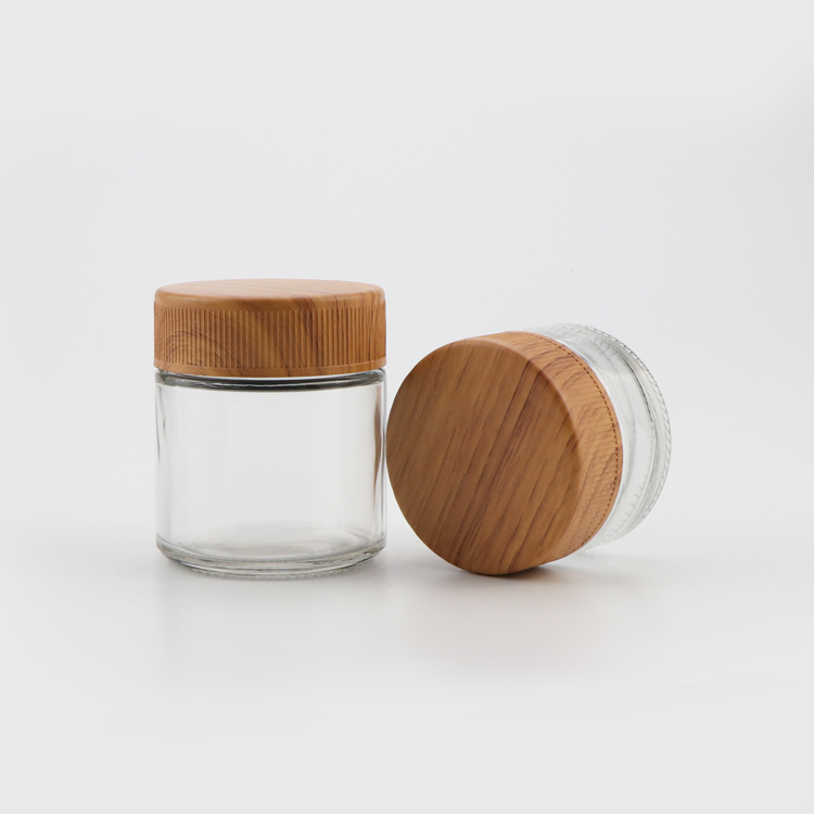 Custom logo 1 2 3 4 ounce hemp childproof smell proof container clear thick wall stash glass jar with wooden lid