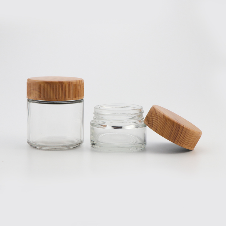 Custom logo 1 2 3 4 ounce hemp childproof smell proof container clear thick wall stash glass jar with wooden lid