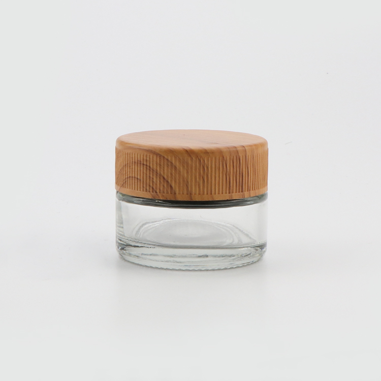 Custom logo 1 2 3 4 ounce hemp childproof smell proof container clear thick wall stash glass jar with wooden lid