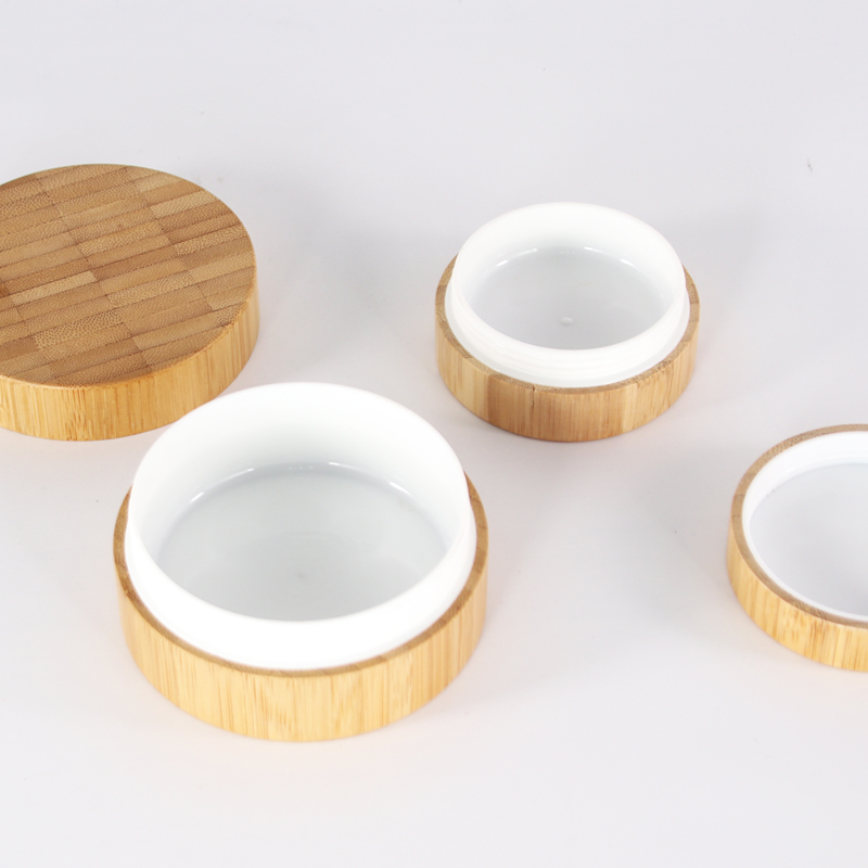 Custom logo 100g 50g 30g Environmental empty full cover bamboo cream jars with plastic inner and PP hand pads in good price