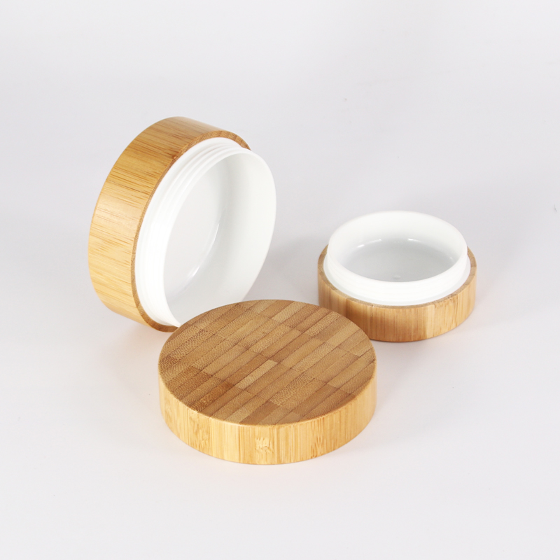 Custom logo 100g 50g 30g Environmental empty full cover bamboo cream jars with plastic inner and PP hand pads in good price