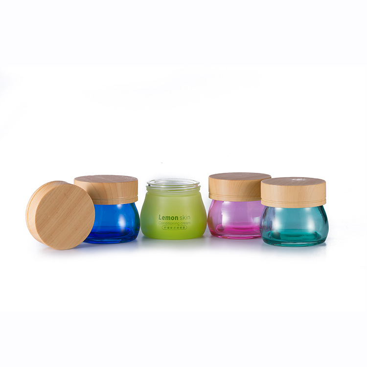 Custom logo 100ml unique packing frosted green wooden lid glass cosmetic cream jar