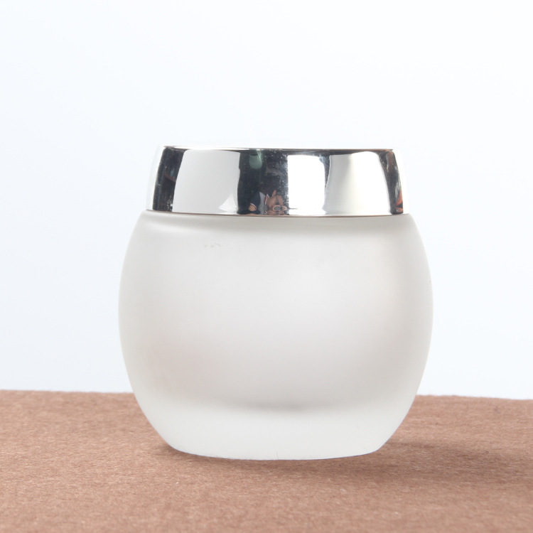 Custom logo 120g frosted drum shape glass jar for cream and mask cosmetic container package for skin care production