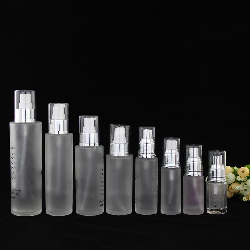 Custom logo 15ml 20ml 25ml 30ml 80ml 100ml 120ml 150ml glass lotion bottle and spray bottle with transparent cap gold line on it